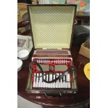 COLLECTABLES - A cased Galotta accordian.