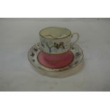 CERAMICS - An antique hand painted mustache cup wi