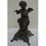 COLLECTABLES - A spelter figure of a Cherub on pli