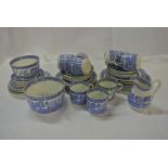 CERAMICS - A large antique willow pattern tea set.