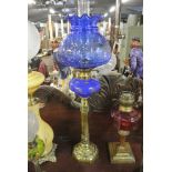 COLLECTABLES - A stunning antique blue glass oil l