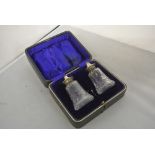 SILVER - A cased set of cut glass salt & pepper sh