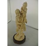 COLLECTABLES - An antique/ Meiji period carved ivo