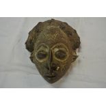 COLLECTABLES - A hand carved tribal mask with shel