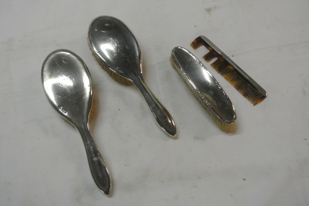 SILVER - An antique sterling silver backed 4 piece