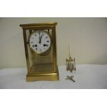 CLOCKS - A stunning striking gilt & glass cased ma