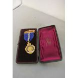 COLLECTABLES - A cased medal reading 'Merit - Cale