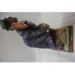 COLLECTABLES - A Capodimonte figure of a clown sta