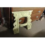 COLLECTABLES - A small cast iron fireplace.