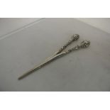 SILVER - An antique pair of glove stretchers, with