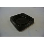 COLLECTABLES - A ceramic ashtray advertising Black