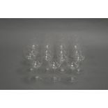 A SET OF FIFTEEN CRYSTAL SHERRY GLASSES. Each embellished with hand cut stars