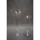 TWO LARGE GLASS VASES, THE TALLER MEASURING 60CM HIGH