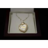 9CT GOLD HEART PENDANT.