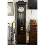 A CONTINENTAL LONG CASE CLOCK WITH DOMED GLASS.