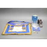 COLLECTION OF MASONIC REGALIA. Including apron, jewels, glasses and 1968 book of masonic rituals.