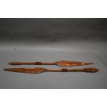 PAIR OF DECORATIVE WOODEN AFRICAN SPEARS. Length 105cm.