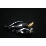 18ct GOLD AND SILVERIUM (A late 1980s process trademarked by Cartier) PANTHER PENDANT. From the