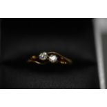 18CT GOLD DIAMOND RING. 2 STONES. Size P. Total weight 2.3g.