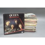 LARGE COLLECTION OF VINYL INCLUDING QUEEN, BILLY CONNOLLY AND THE BAND