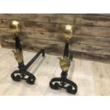 A PAIR OF FRENCH BRASS AND IRON ANDIRONS, length 49cm, height 51cm