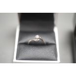 18CT WHITE GOLD SOLITAIRE DIAMOND RING. .2ct Diamond. Size M. Total weight 3g.