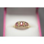 AN ANTIQUE 18CT GOLD RUBY DIAMOND RING, SIZE O, WEIGHT 2.1g