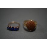 2 GOLD RINGS. One 10ct Gold and blue stone. Size L. Total weight 2.4g. One 9ct Gold and gemstone