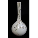 An Edward Webb Propeller mark glass bottle vase, pale yellow colouration gilded with vines and an