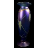Richard P Golding for Okra glass, a footed slender baluster vase with wavy rim, the body of cobalt