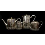 A Victorian Silver plated four piece tea service, the teapot and hot water jug with mother of