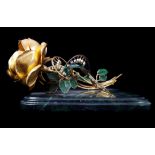 A Princess Grace Royal Anniversary Rose, by Igor Carl Faberge, a diamond and emerald set whorl