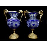 A pair of Martin Benito cut glass vases with ormolu mounts, the blue overlay bodies cut through to