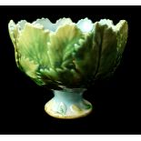 An English majolica strawberry service sugar bowl, Minton or George Jones, the bowl formed from