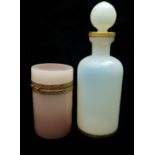 An opaline glass toilet water bottle and stopper with gilt metal mounts, and a Murano cylindrical