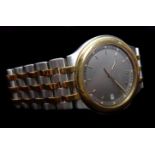 A steel and gold unisex Chopard Geneve Monte-Carlo wrist watch, with gun metal grey dial with date