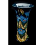 Philip Gibson for Moorcroft Pottery. A blue Rapsody pattern waisted cylindrical vase, produced for