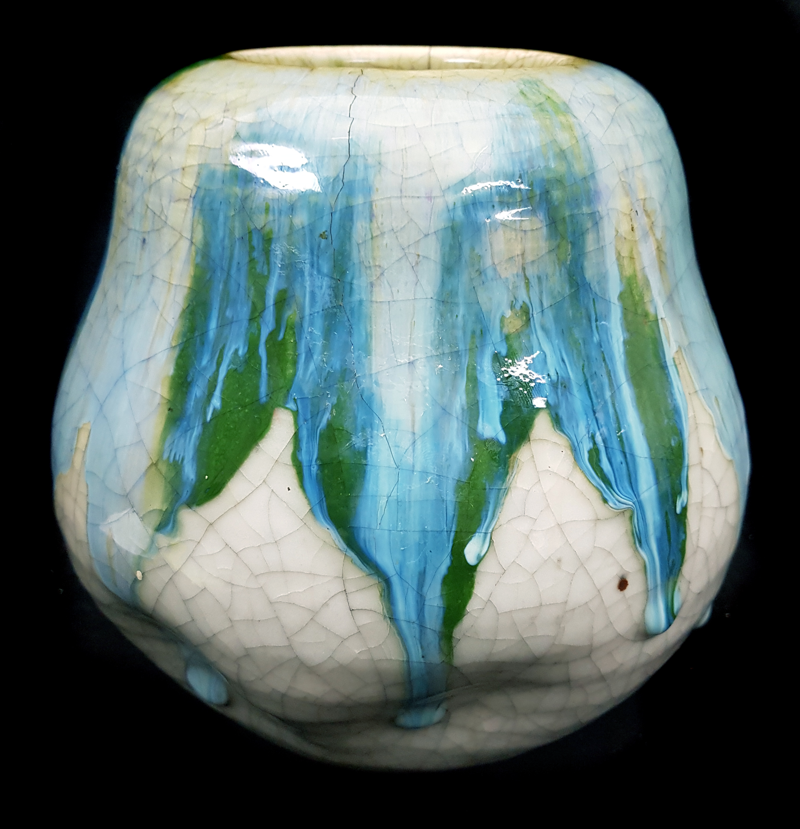 A Chinese pottery crackle glaze jar, with blue/green drip trails, impressed seal mark to base, 17.