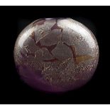 An Isle of Wight glass vase of Azurene pink colouration and of flattened globular form, gold paper