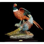 Juliana Collection - A pair of pheasants, cast in resin on fixed wood base, original paper label,