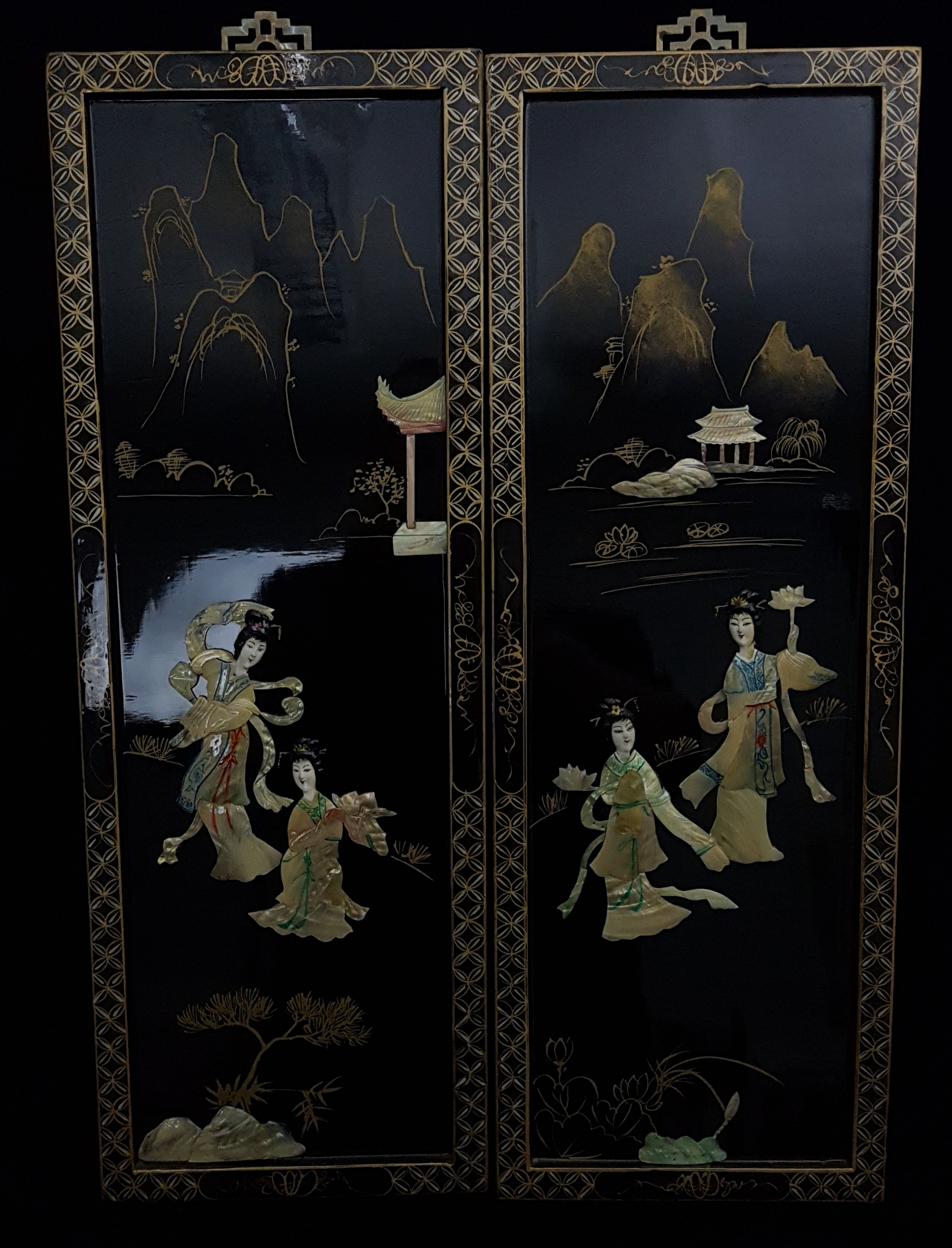 A pair of Chinese black laquer panels, 23cm max (2)