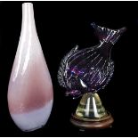 A Chinese art glass fish, blue and pink on colourless glass; a carved wood stand; and a pink glass