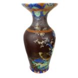 A Japanese Fukagowa porcelain baluster vase, decorated with bamboo and flowering plants on a