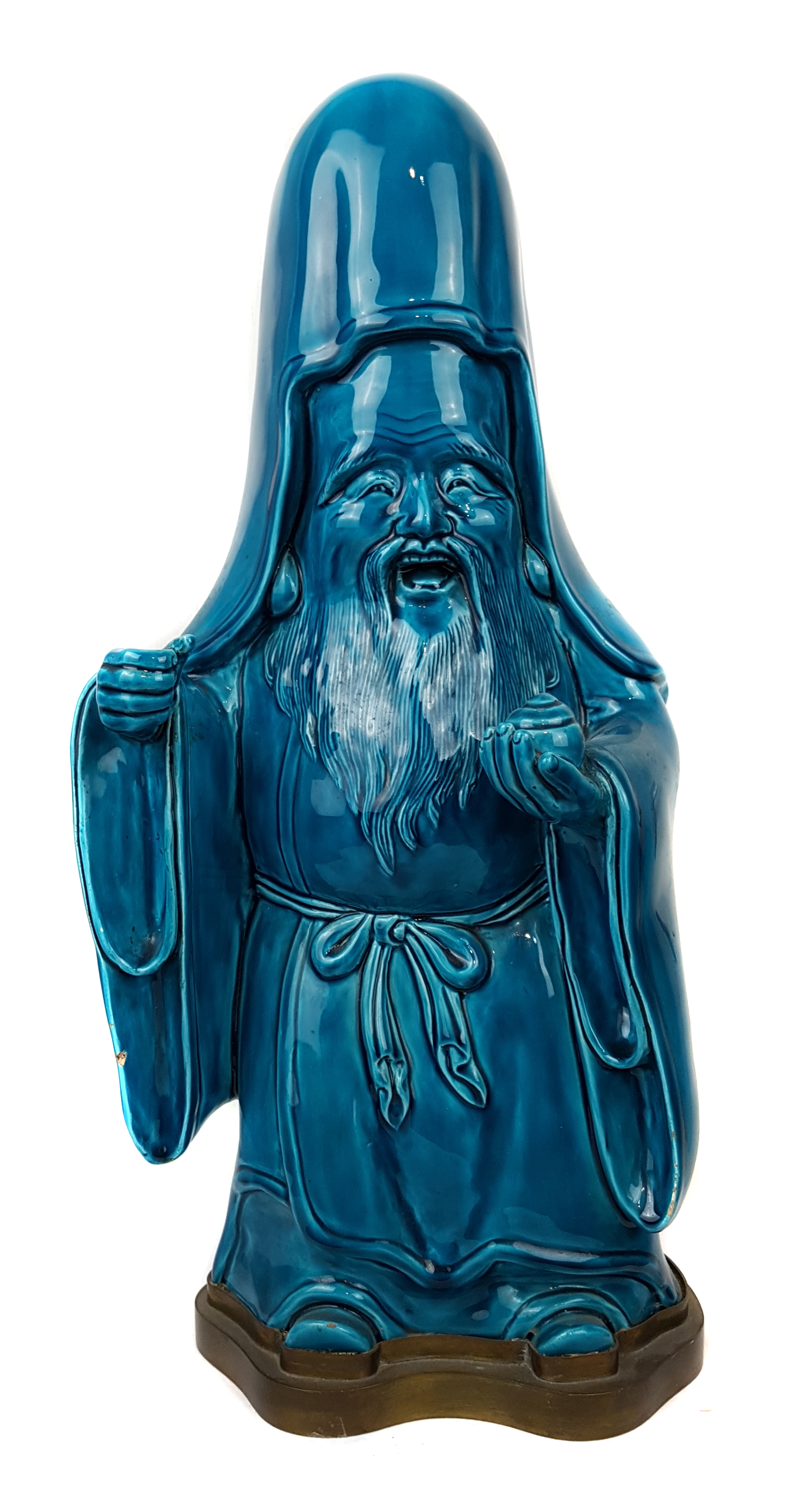 A Japanese porcelain figure of Fukurokuju, the whole covered in bright turquoise glaze, the deity