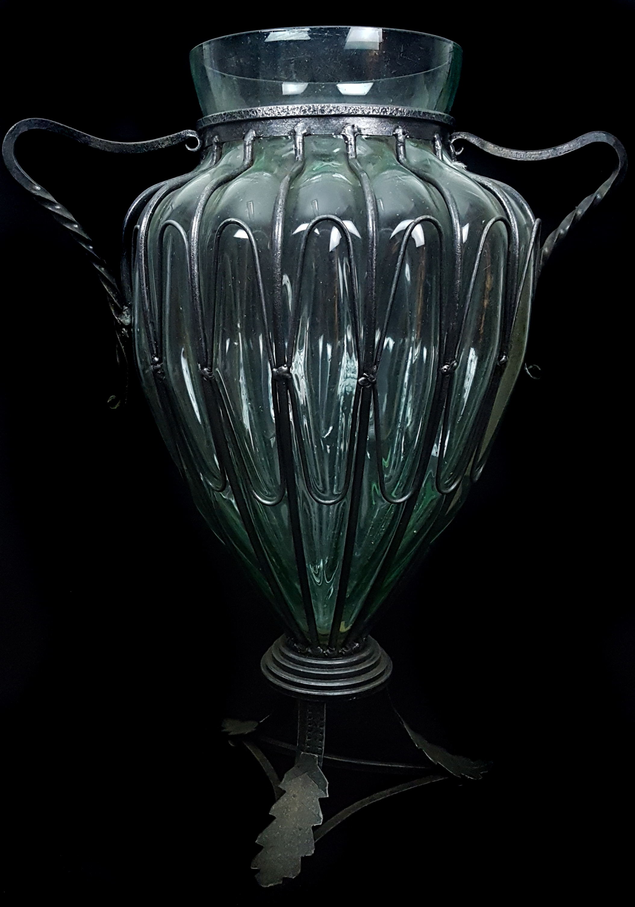 A bronzed metal and glass ewer, the ovoid glass body painted with cherubs, 62cm high