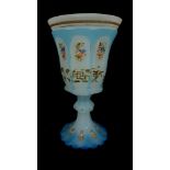 A Bohemian two colour opaline challis, turquoise cut through to white wit ascher enamelled and