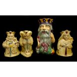 A Shorter majolica Father Neptune jug, 26 cm high; and three H J Wood, Pack of Cards series jugs,