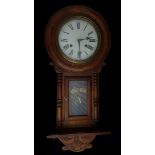 A Vienna regulator wall clock, circular dial over glass cabinet door, gilded with 'Regulator A',