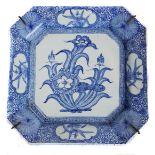 A Japanese porcelain blue and white dish, of canted square form, decorated in blue and white with