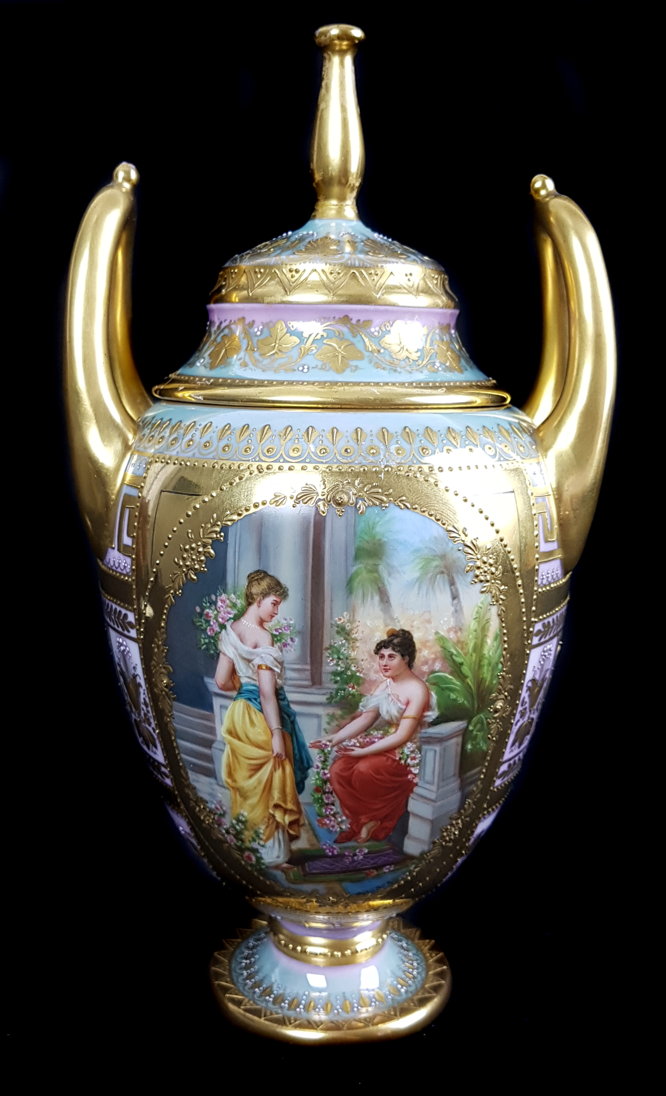 A Vienna porcelain vase and cover, signed Wagner, of ovoid form with high loop handles, decorated